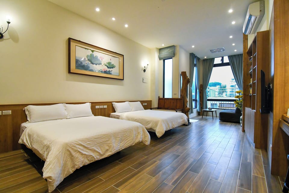 Exclusive Quadruple Room | Desk, blackout drapes, free WiFi, bed sheets