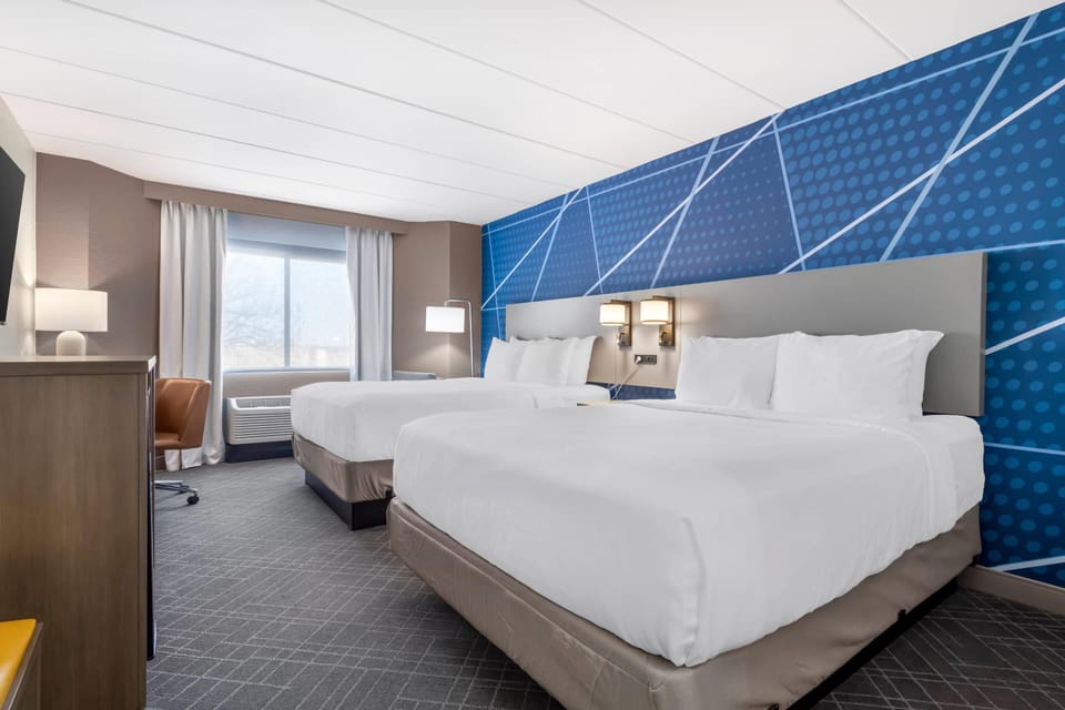 Standard Room, 2 Queen Beds, Non Smoking | Pillowtop beds, individually furnished, desk, laptop workspace