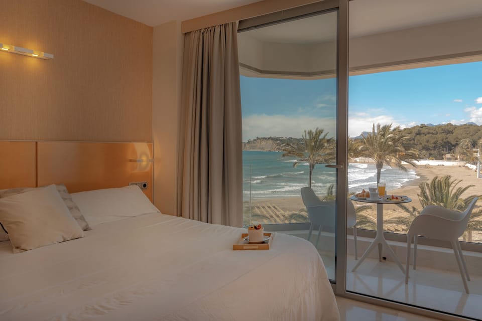 Junior Suite, Sea View | Living area | 44-inch flat-screen TV with satellite channels, TV