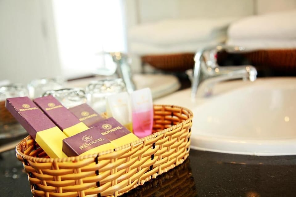 Shower, free toiletries, hair dryer, slippers