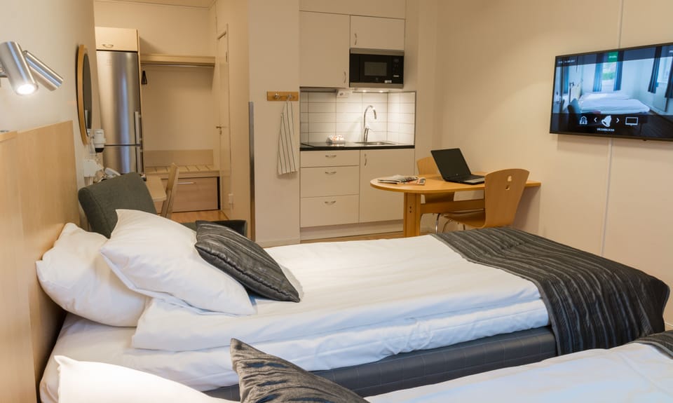 Family Double or Twin Room, 1 Bedroom | In-room safe, desk, laptop workspace, blackout drapes