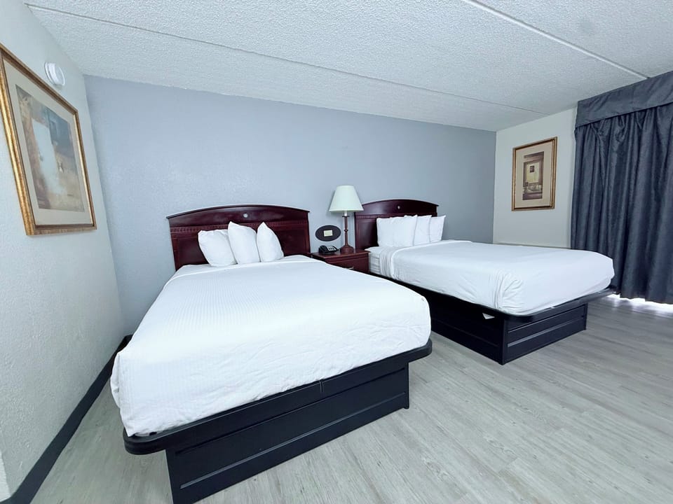 Room, 2 Double Beds, Non Smoking (Pet Friendly) | Desk, laptop workspace, iron/ironing board, free cribs/infant beds