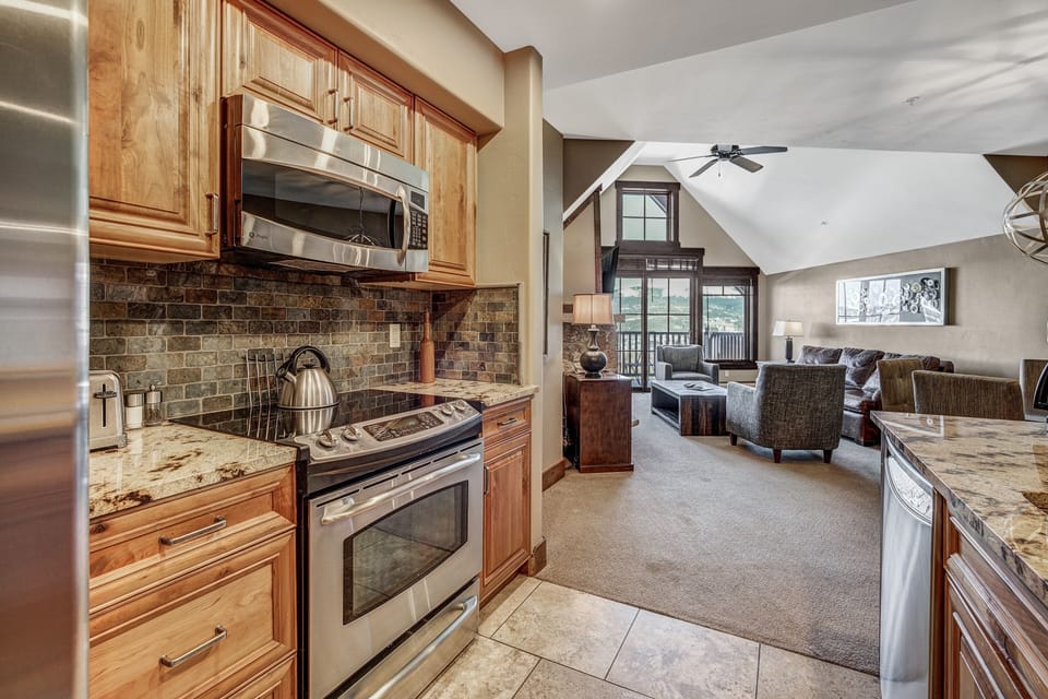 Condo, 2 Bedrooms | Private kitchen | Full-size fridge, microwave, oven, stovetop