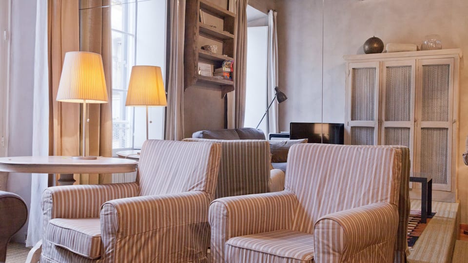 Apartment, 1 Bedroom | Living room | Flat-screen TV