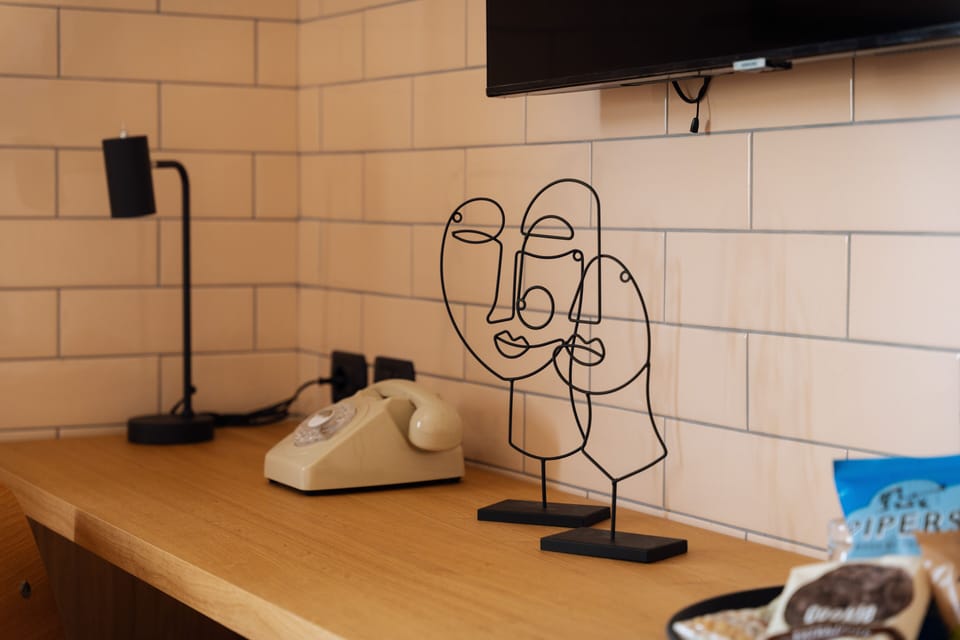 Suite, Balcony | Minibar, in-room safe, desk, free WiFi