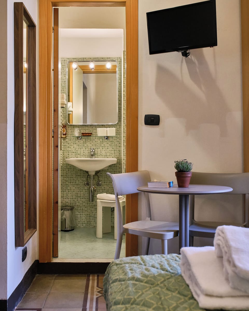 Triple Room | In-room safe, desk, laptop workspace, blackout drapes