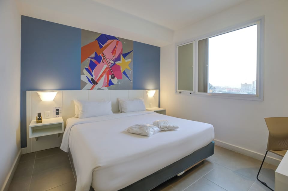 Standard Double Room, 1 Queen Bed | Minibar, in-room safe, desk, blackout drapes
