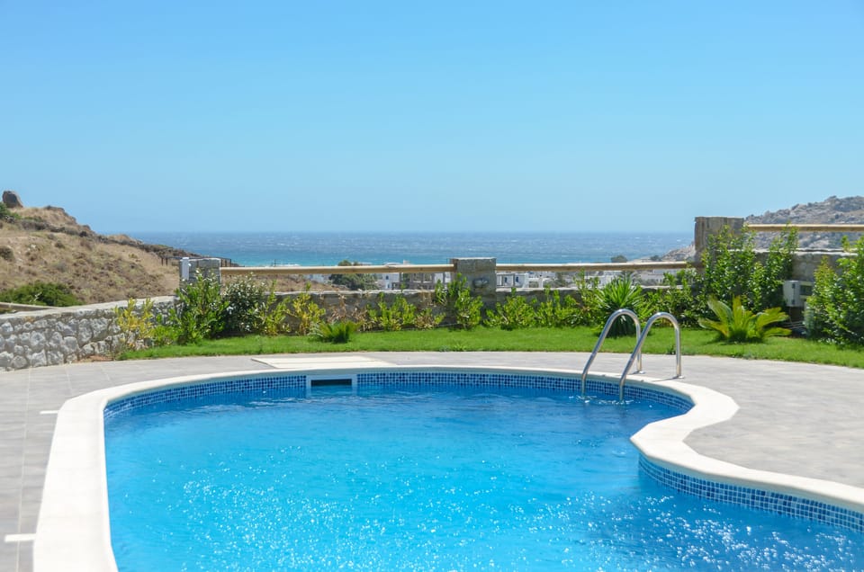 Outdoor pool, open 10:00 AM to 8:00 PM, pool umbrellas, sun loungers