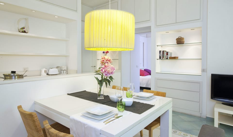 Family Quadruple Room, Terrace | Living area | 30-inch flat-screen TV with satellite channels, TV