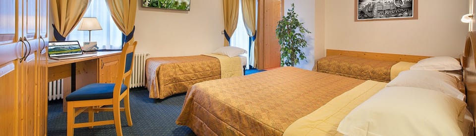 Quadruple Room | In-room safe, desk, cribs (free), WiFi (free)