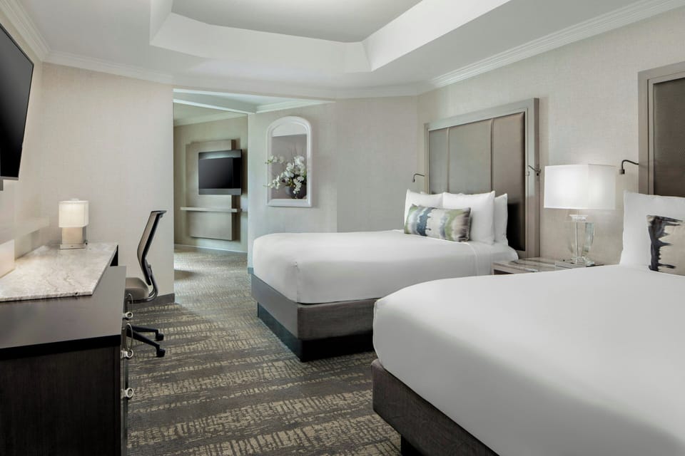 Premium bedding, down comforters, in-room safe, desk