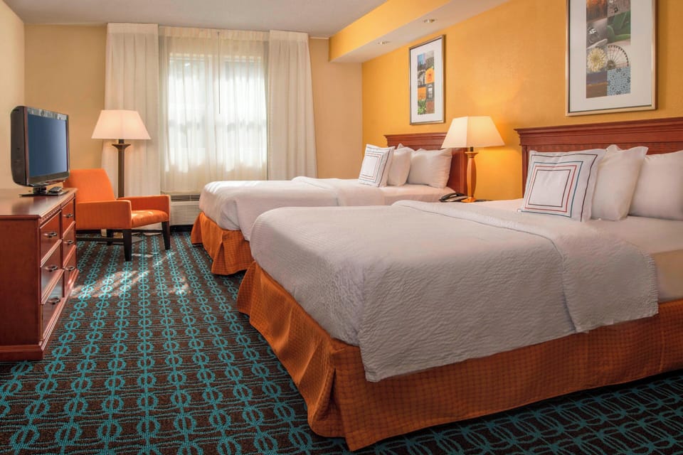Suite, Multiple Beds | Premium bedding, in-room safe, desk, laptop workspace