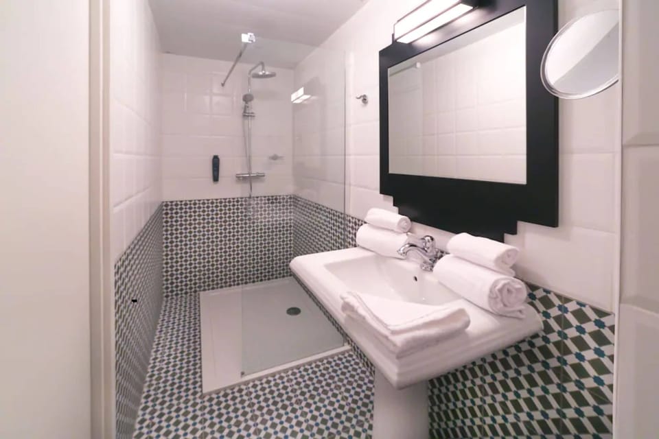 Shower, free toiletries, hair dryer, bathrobes