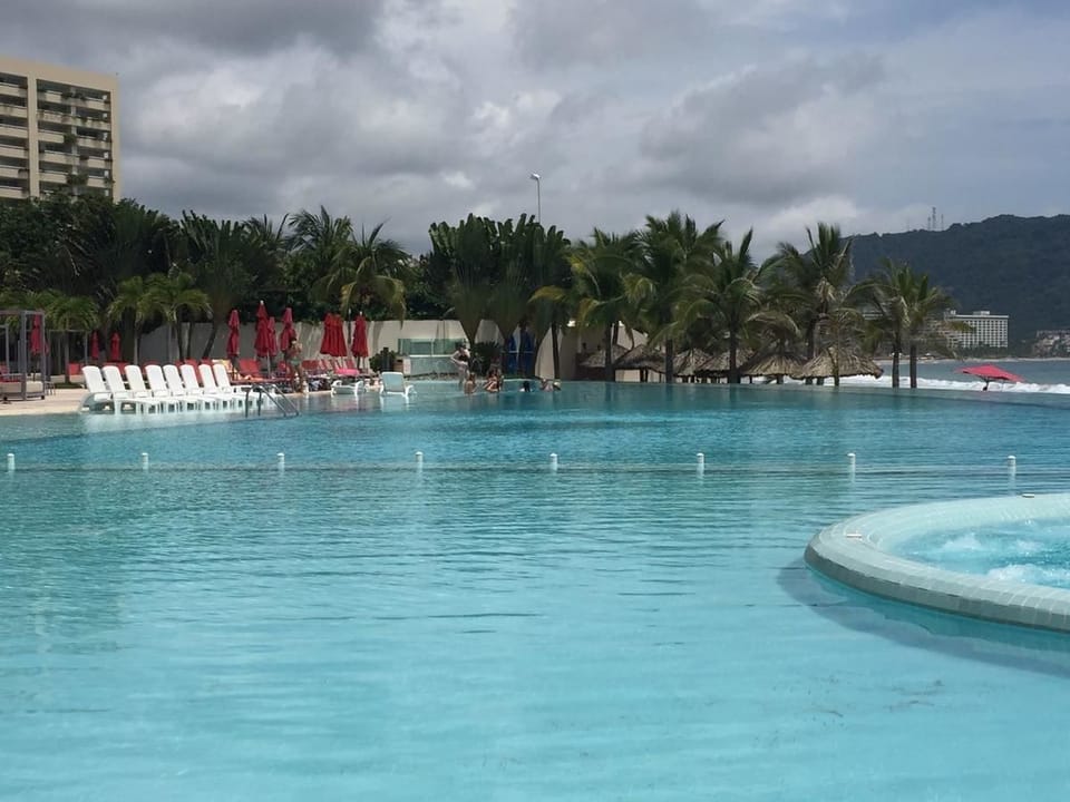 Outdoor pool, open 9 AM to 9 PM, pool umbrellas, sun loungers