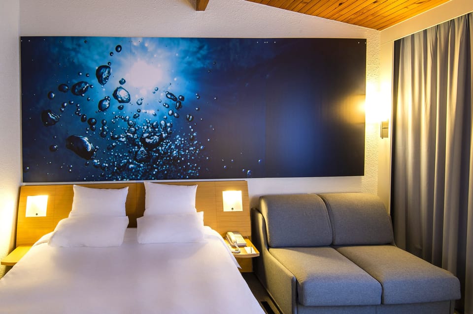 Premium bedding, memory foam beds, in-room safe, desk