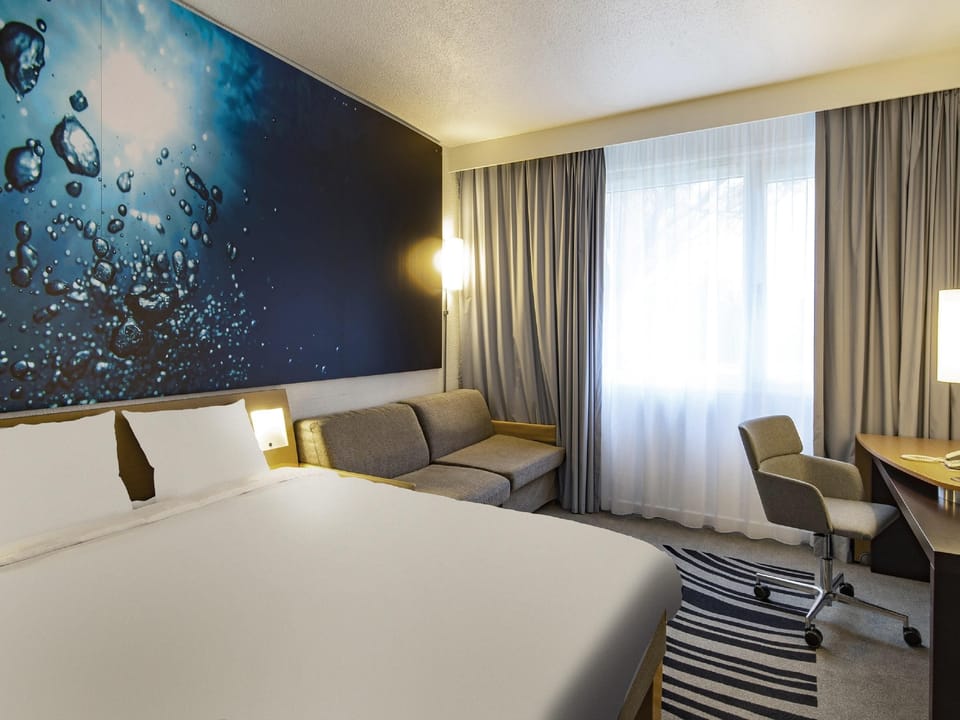 Premium bedding, memory foam beds, in-room safe, desk