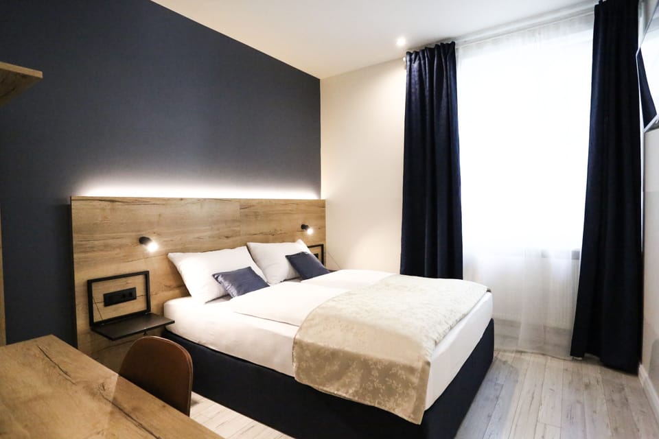Double Room | Desk, blackout drapes, soundproofing, iron/ironing board (on request)
