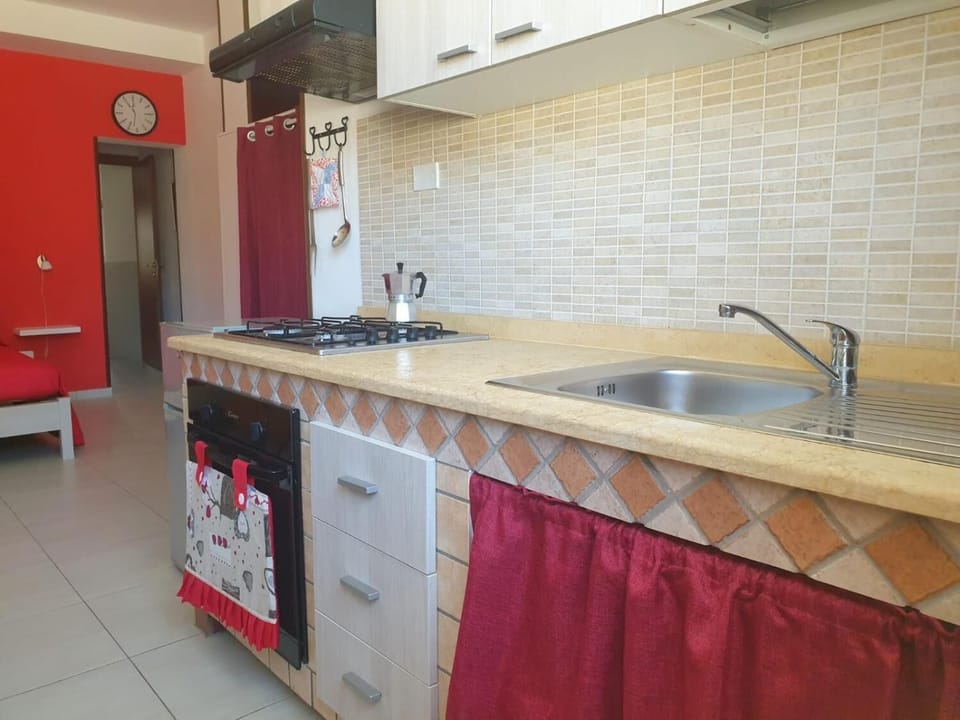 Fridge, stovetop, cookware/dishes/utensils