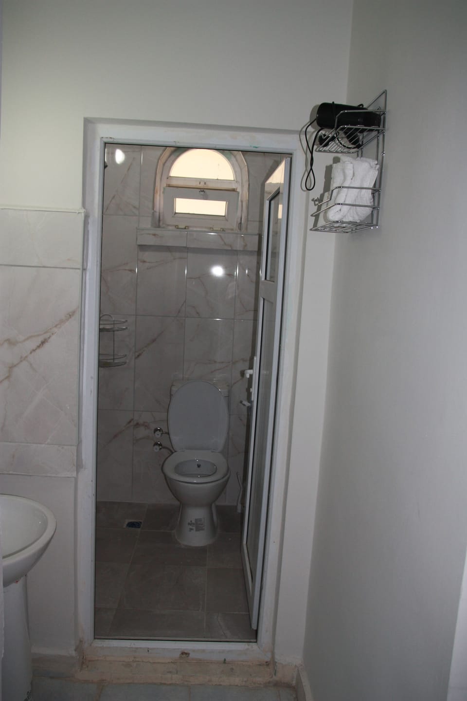 Shower, free toiletries, hair dryer, slippers