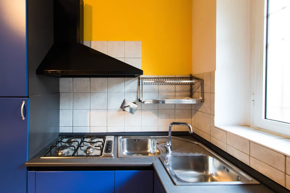 Apartment, Balcony | Private kitchen | Fridge, microwave, stovetop, coffee/tea maker