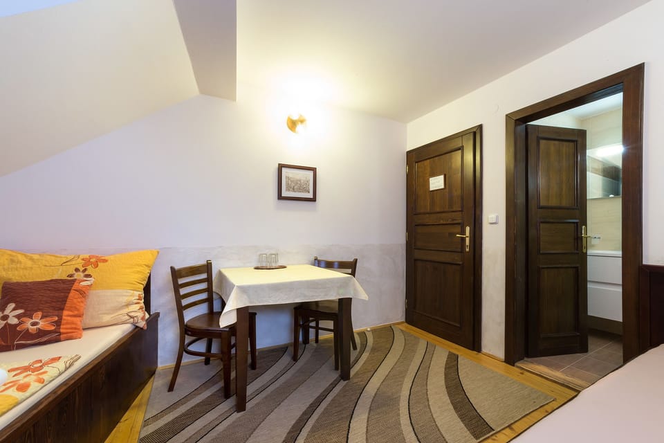 Triple Room | Minibar, desk, iron/ironing board, free WiFi