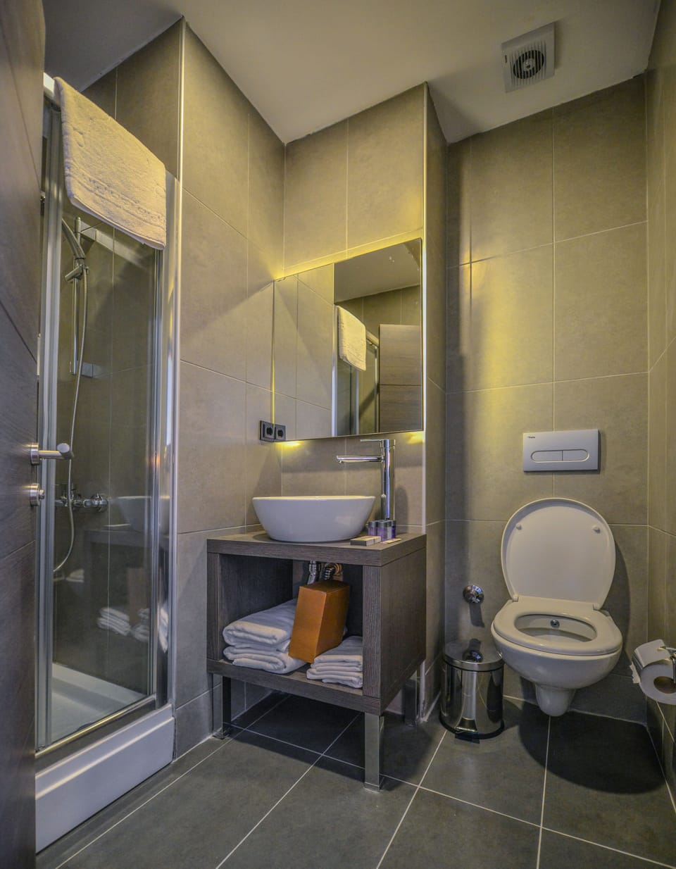 Shower, free toiletries, hair dryer, slippers