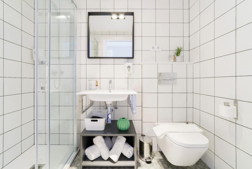 Shower, free toiletries, hair dryer, towels