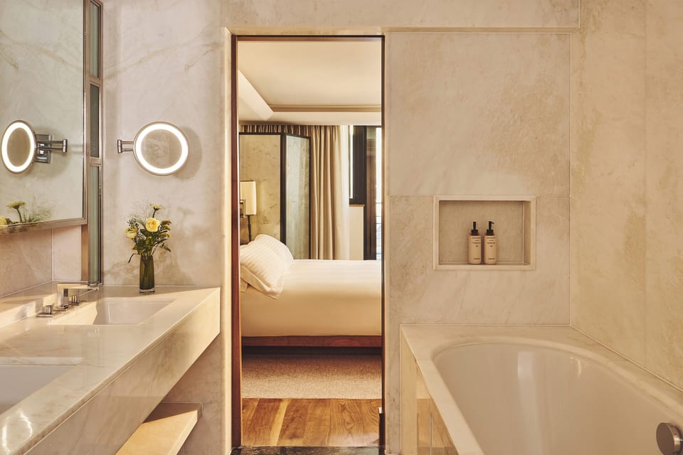Contemporary Deluxe Room | Bathroom | Combined shower/tub, designer toiletries, hair dryer, bathrobes