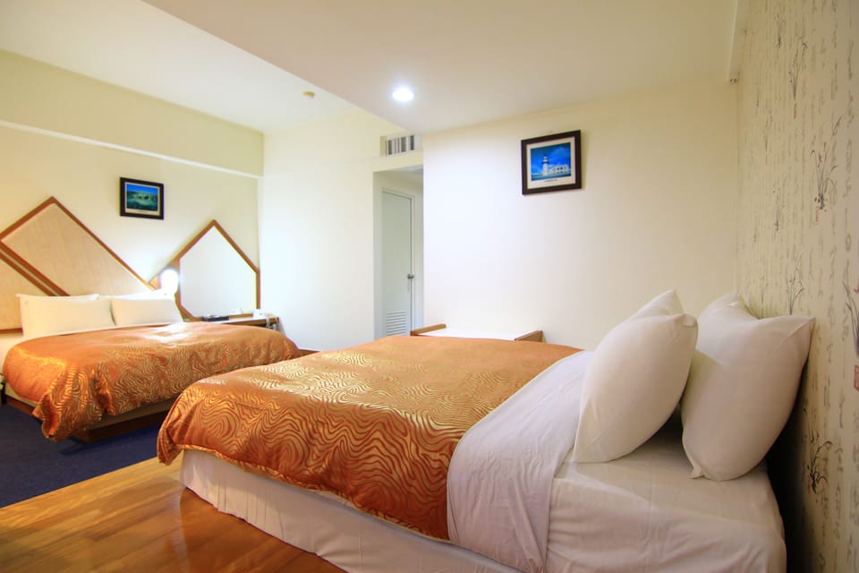 Deluxe Quadruple Room, 2 Double Beds, Sea View | Free WiFi, bed sheets