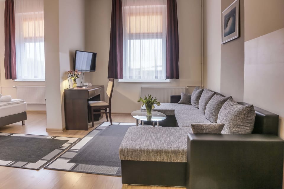 Comfort Double Room | Living area | Flat-screen TV