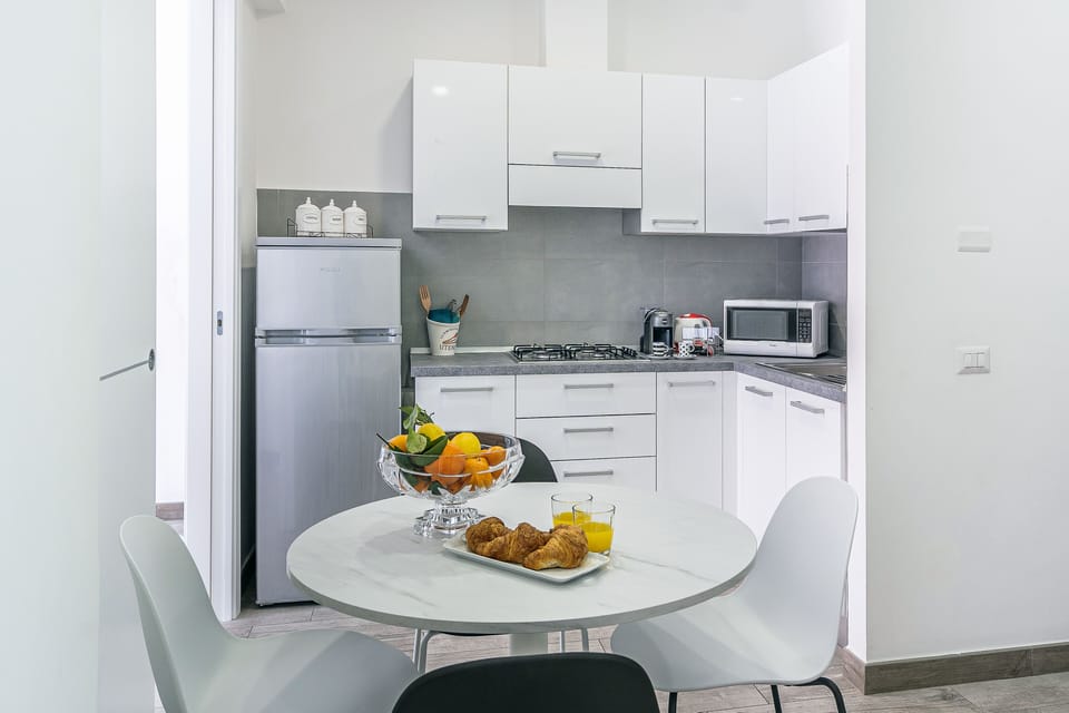 Apartment, 2 Bedrooms | Private kitchen | Dining tables