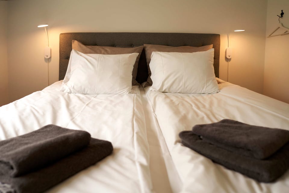 Deluxe Double Room, 1 King Bed, Shared Bathroom | Premium bedding, individually decorated, blackout drapes, free WiFi