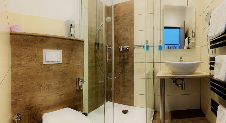 Shower, free toiletries, hair dryer, towels