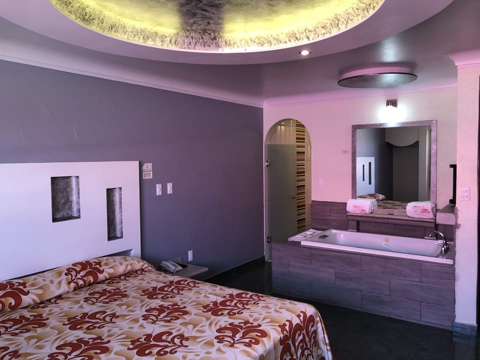 Exclusive Room, Jetted Tub | Individually decorated, individually furnished, laptop workspace