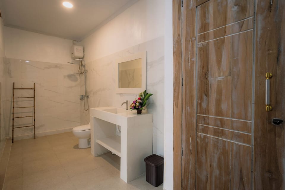 Shower, towels, soap, shampoo