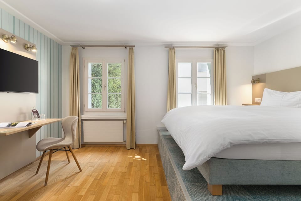 Standard Double Room | Living area | Flat-screen TV