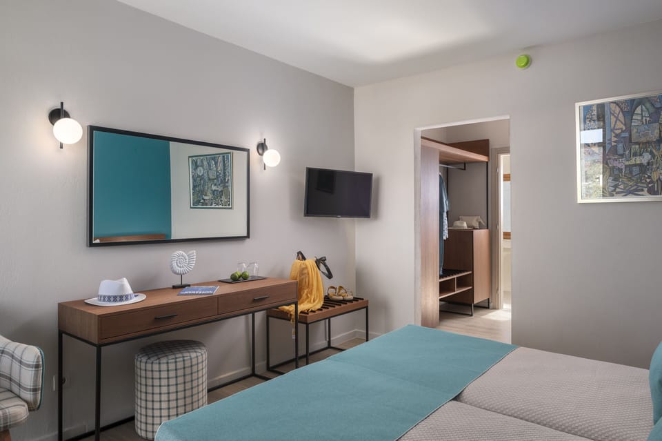 Standard Room, Partial Sea View | In-room safe, desk, free WiFi, bed sheets
