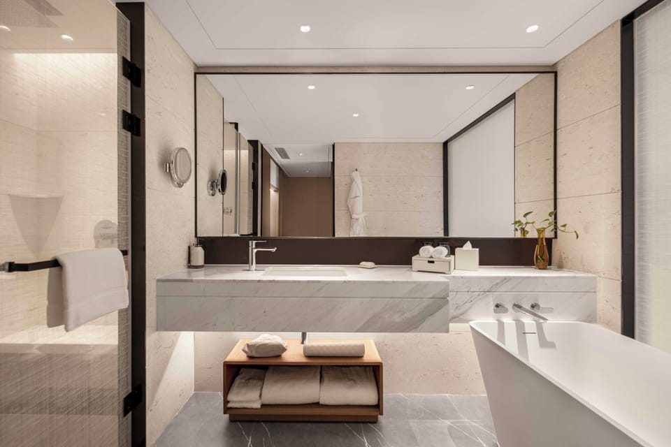 Shower, rainfall showerhead, eco-friendly toiletries, hair dryer