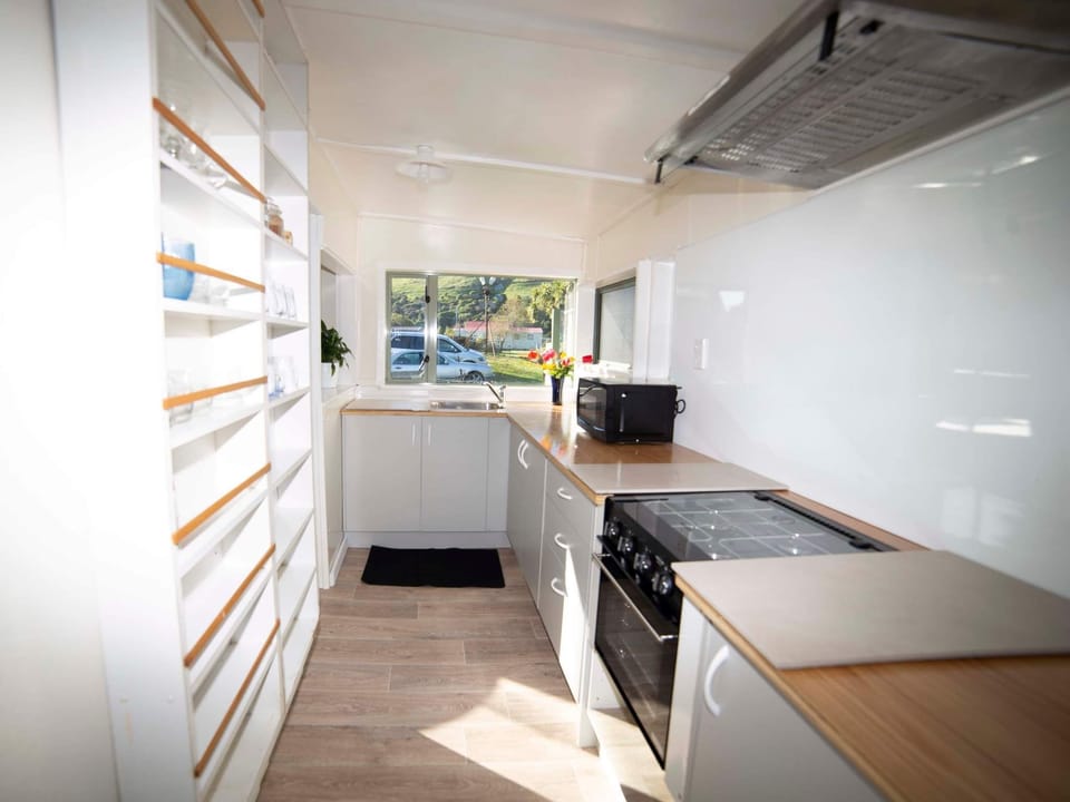 Self Contain Apartment | Private kitchen | Shared fridge, microwave, oven, stovetop