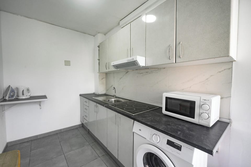 Apartment | Private kitchen | Fridge, microwave, oven, stovetop