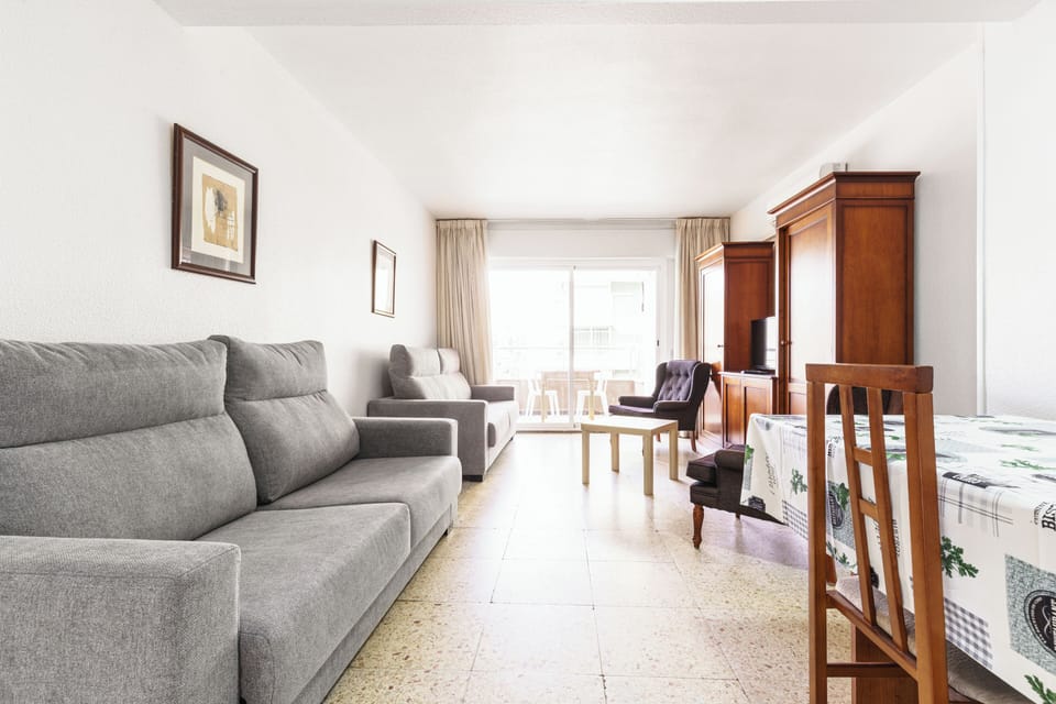 Apartment, 3 Bedrooms, Balcony, City View | Living area | TV