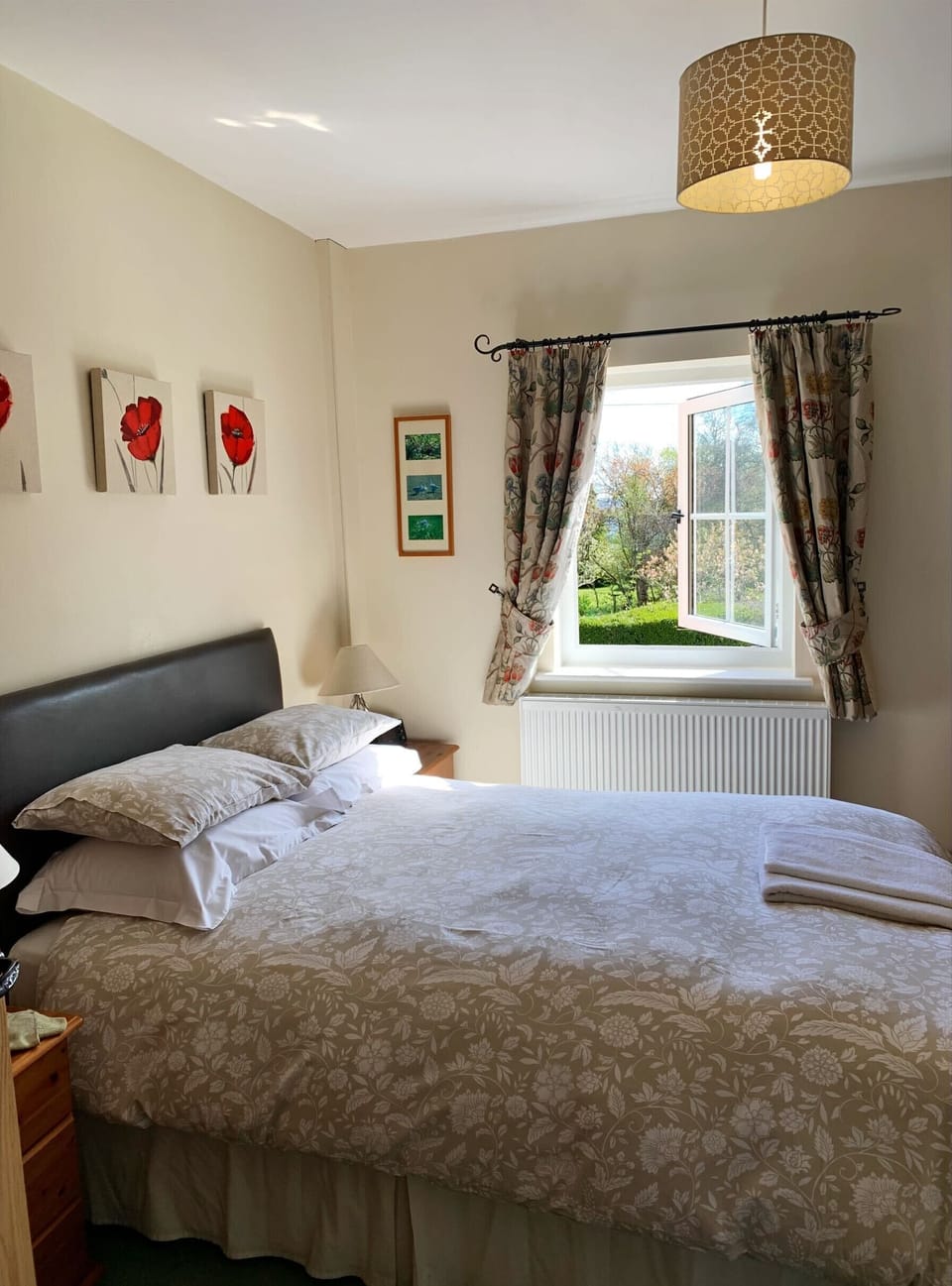 Premium bedding, desk, laptop workspace, iron/ironing board