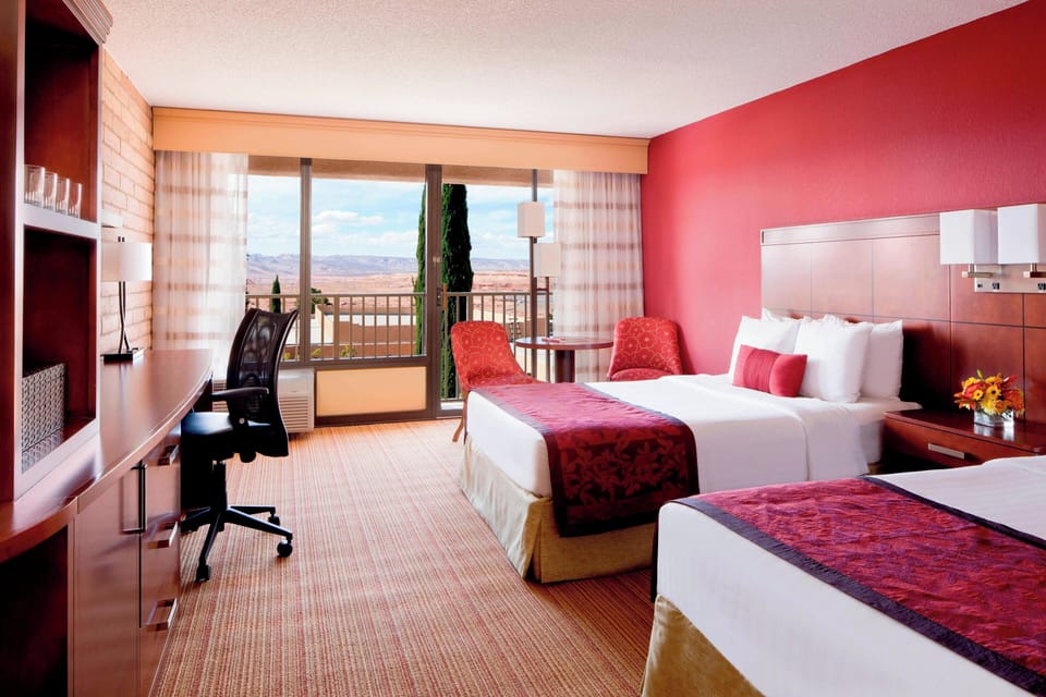 Room, 2 Queen Beds | In-room safe, desk, iron/ironing board, free cribs/infant beds