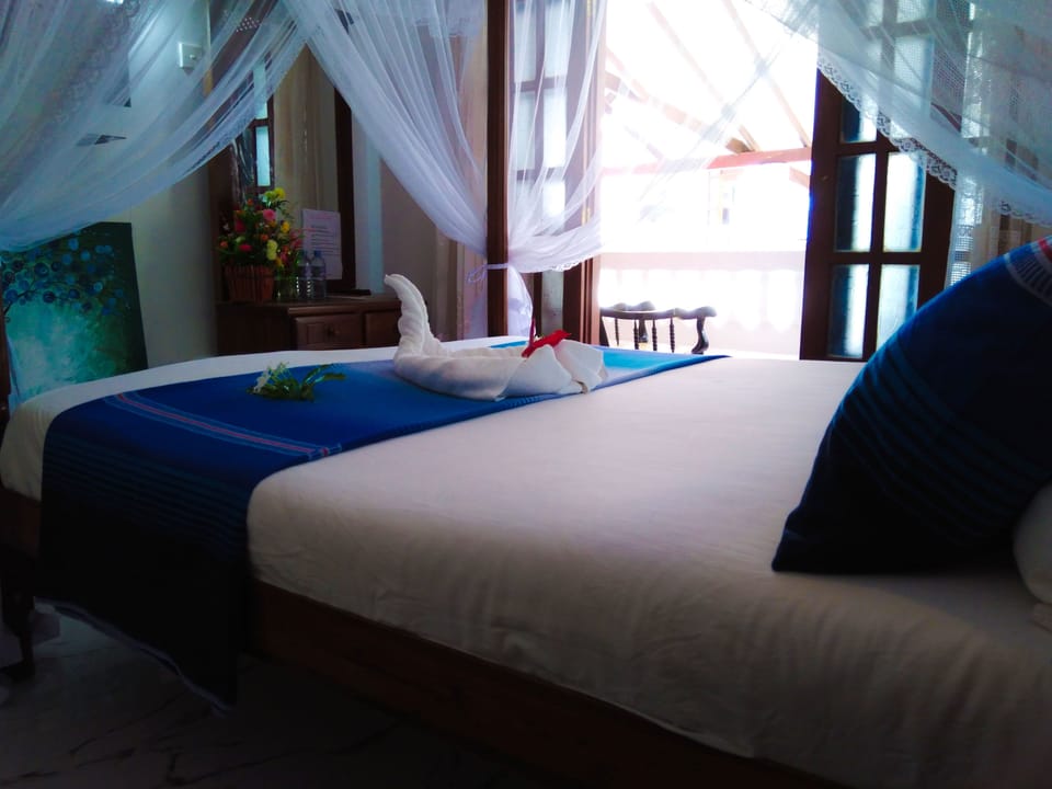 Standard Double Room, Refrigerator, Pool View | 1 bedroom, premium bedding, free minibar items, in-room safe
