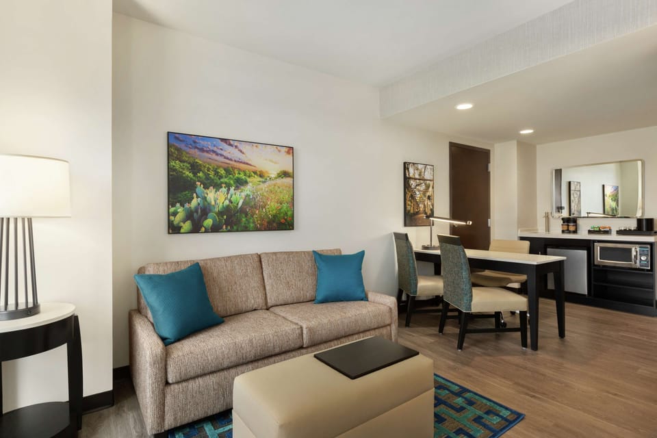 Suite, 1 King Bed (1-Room Suite) | 1 bedroom, in-room safe, desk, laptop workspace