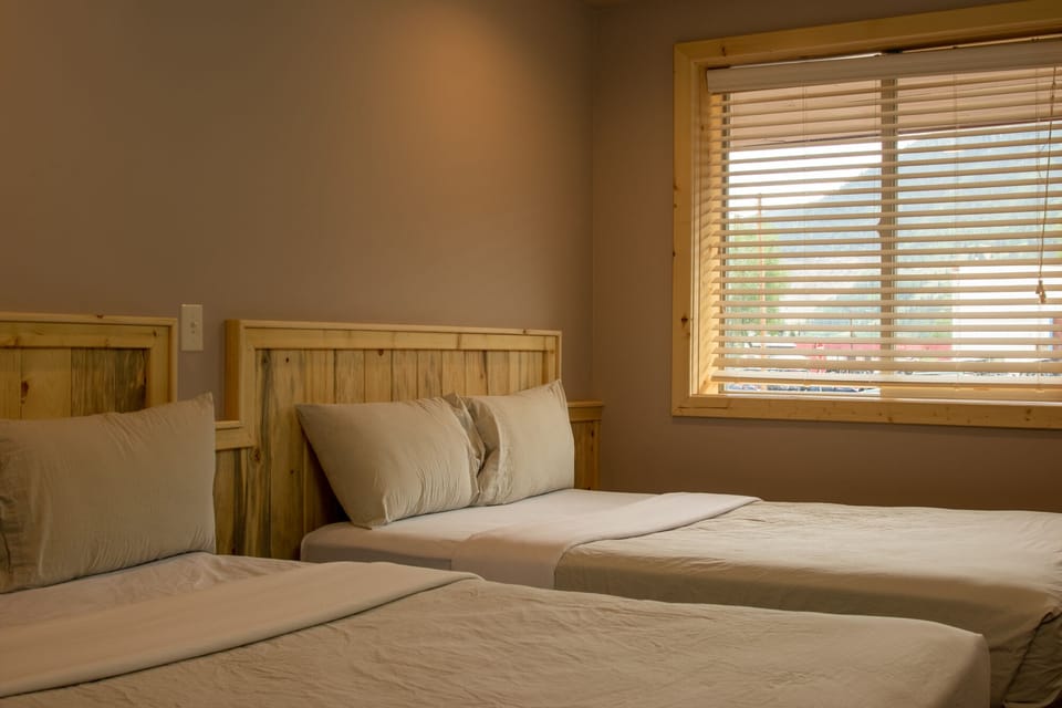 Room #5 | Desk, bed sheets