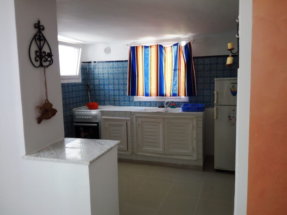 Family Apartment, 1 Bedroom, Beachside | Private kitchen | Full-size fridge, oven, stovetop, toaster