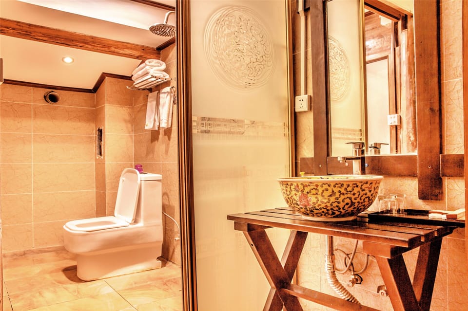 Standard Double Room | Bathroom | Shower, free toiletries, hair dryer, slippers