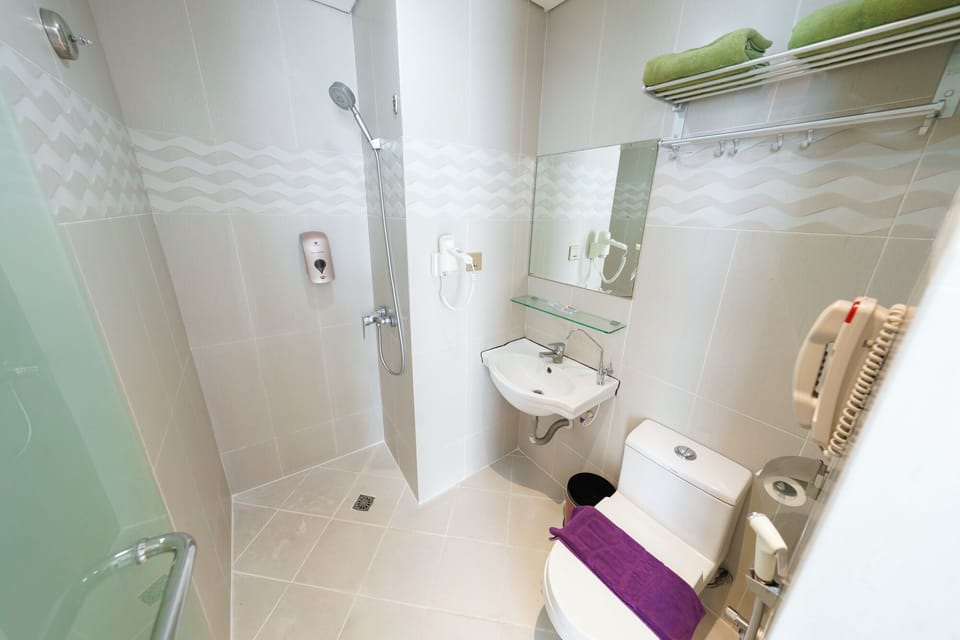 Shower, free toiletries, hair dryer, slippers