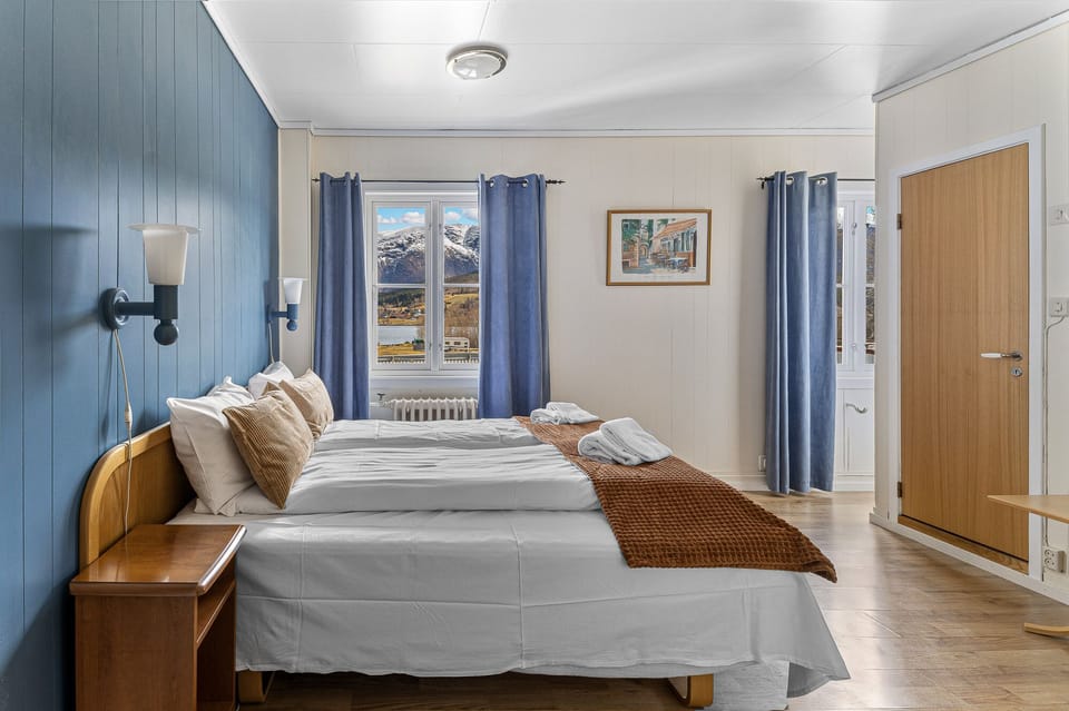 Classic Double Room, 1 Bedroom, Mountain View | Blackout drapes, iron/ironing board, free WiFi, bed sheets